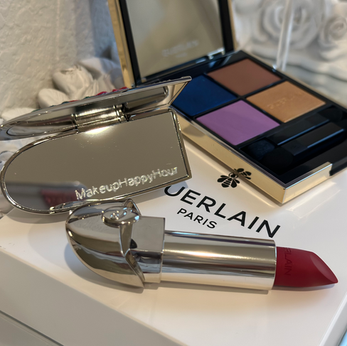 open palette showing shades and open lipstick with engraved case