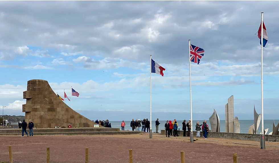 Flags at Omaha representing the thirteen countries who participated in D-Day: Britain, America, Canada, France, Poland, the Netherlands, Belgium, Czechoslovakia, Denmark, Norway, Australia, New Zealand, and Luxembourg,