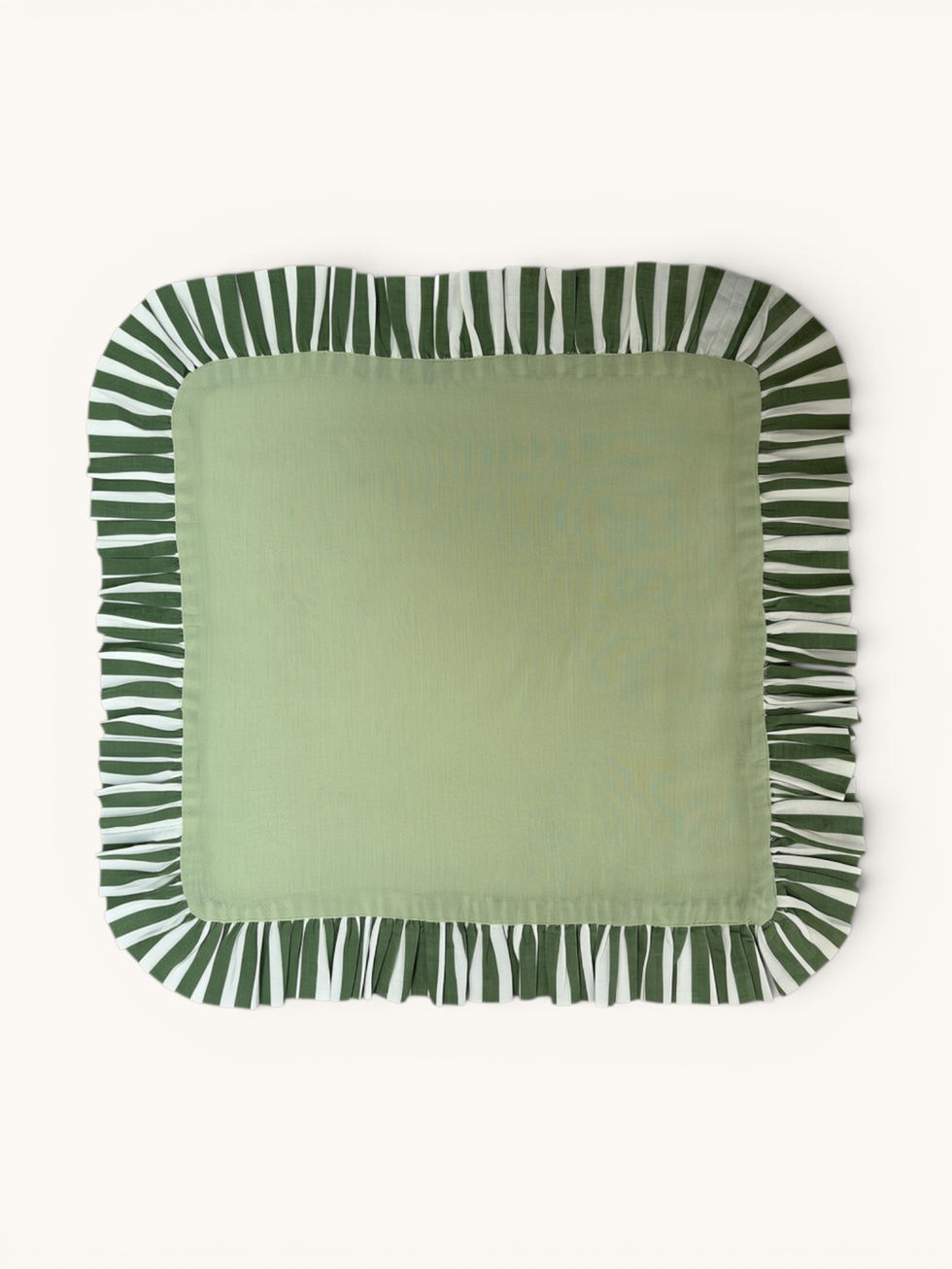 Mint & Forest Green Pastel cotton ruffle napkins with contrasting striped trim, styled on a dining table