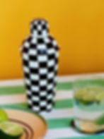 Brown and off-white hand-painted chequered cocktail shaker with glossy finish.