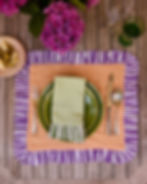 Mint & Forest Green Pastel cotton ruffle napkins with contrasting striped trim, styled on a dining table