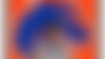 Tyson Degenhart in Boise State basketball uniform with Bronco logo in background.