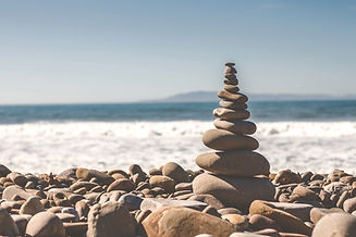 Stacked stones by ocean_edited.jpg
