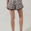 Thumbnail: Corinne Abstract Print Pom Trim Belted Shorts