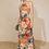 Thumbnail: Isabela Floral Halter Slit Tie Back Maxi Dress