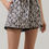 Thumbnail: Corinne Abstract Print Pom Trim Belted Shorts
