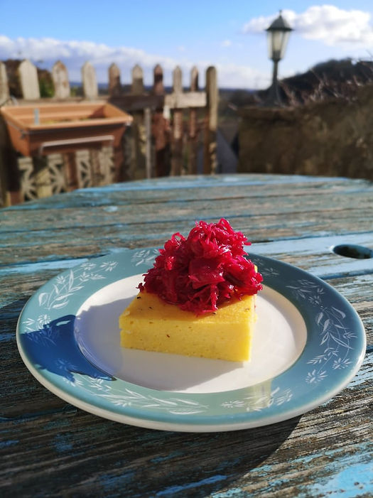 Cheesy polenta with Reclaimed Red Kraut