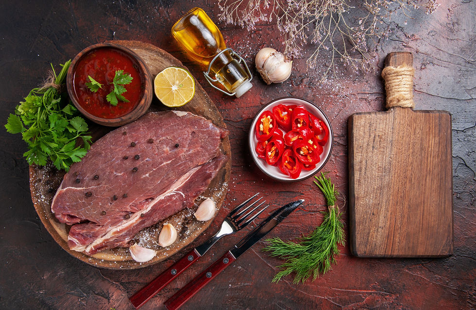 horizontal-view-red-meat-wooden-tray-garlic-green-ketchup-chopped-pepper-oil-bottle-cuttin