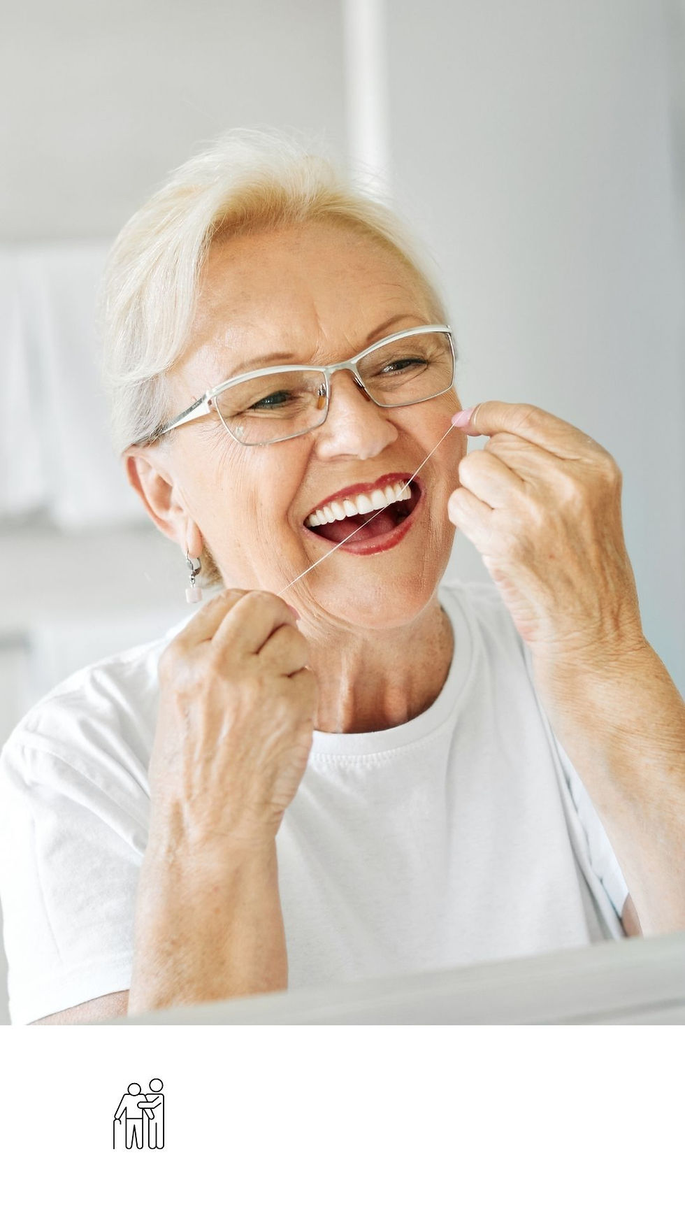 elderly woman flossing her teeth