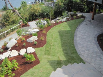 Waterfront property in victoria british columbia with complete landscaping overhaul.