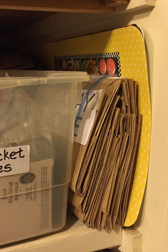Bag of sacks stored beside bin in storage room / How to Organize a TOTAL MESS! / www.HoneycombOasis.com