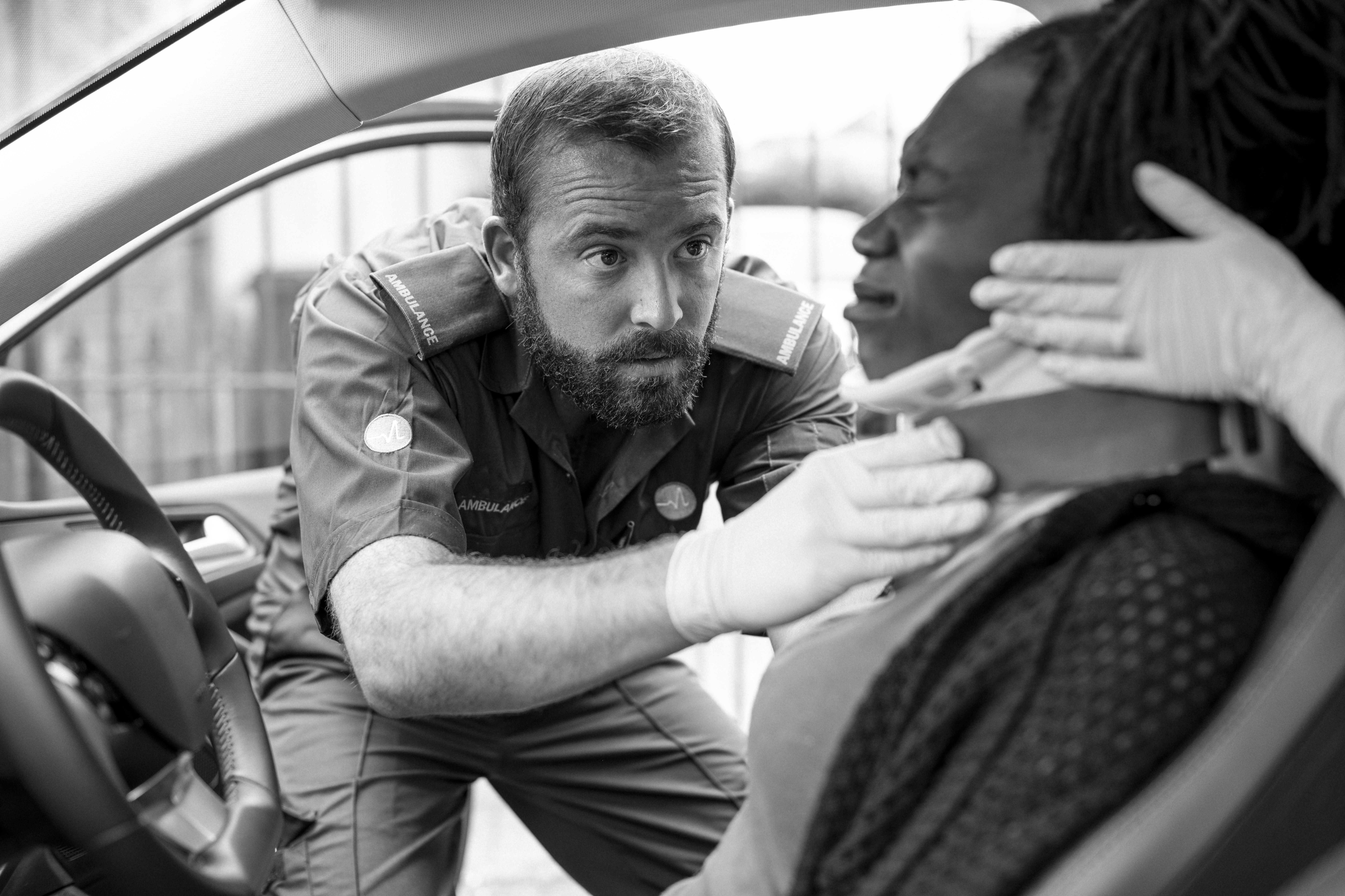 paramedic-placing-cervical-collar-injured-woman-from-car-accident.jpg