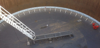 NXT-FC-EFR installation completed with stainless steel platform for existing rolling ladder