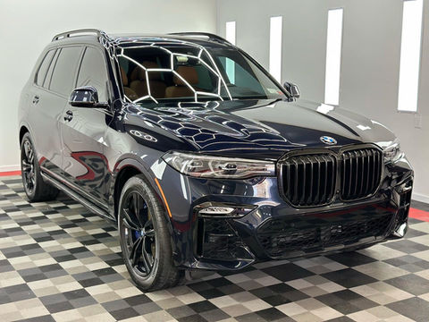 Automotive surface receiving professional ceramic coating application for long-term protection and enhanced appearance, offered by Exclusive Auto Detailing for optimal vehicle care