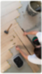 Hardwood floor installation worker in a DC home project