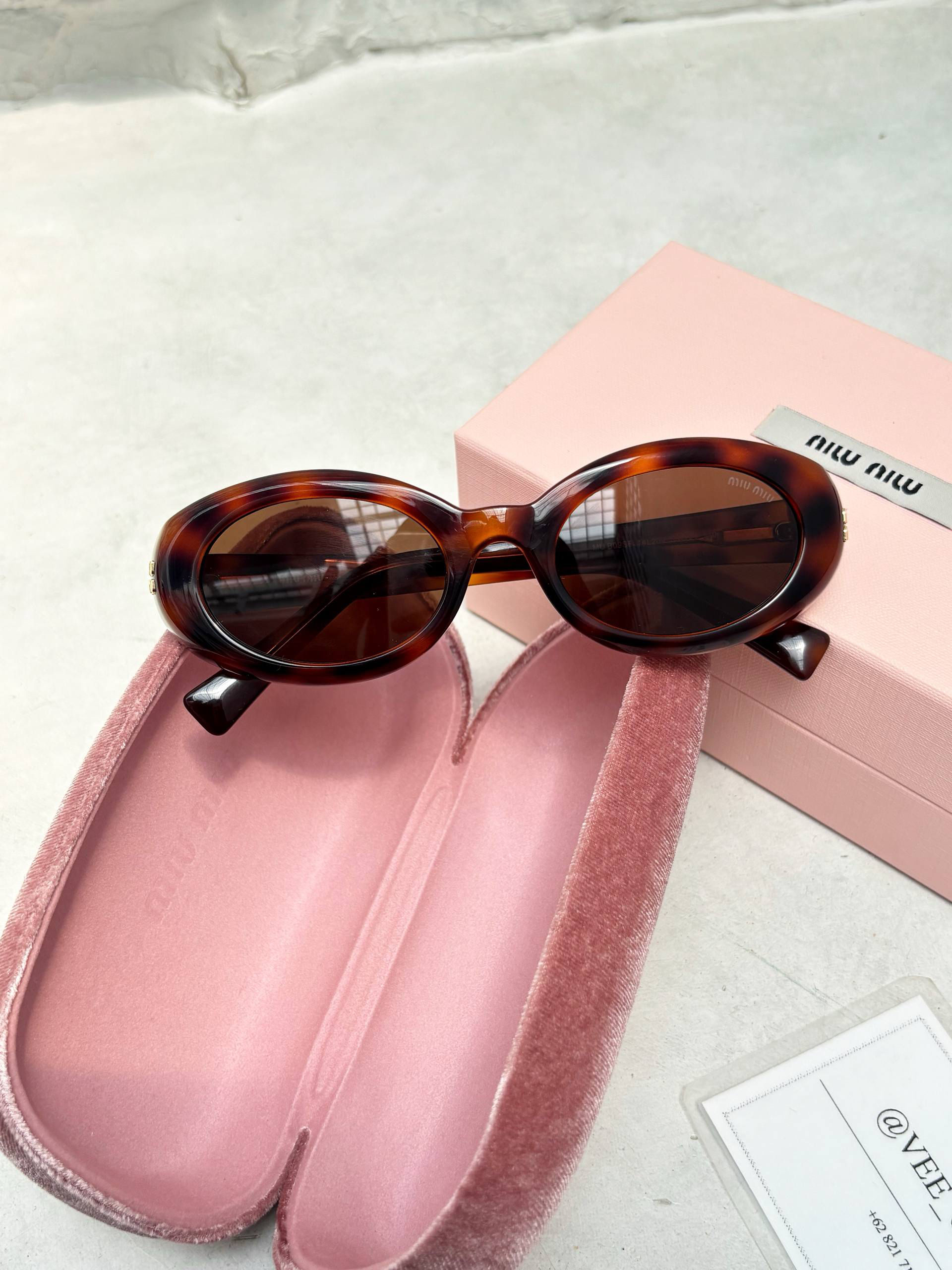 MIU MIU GLASSES
