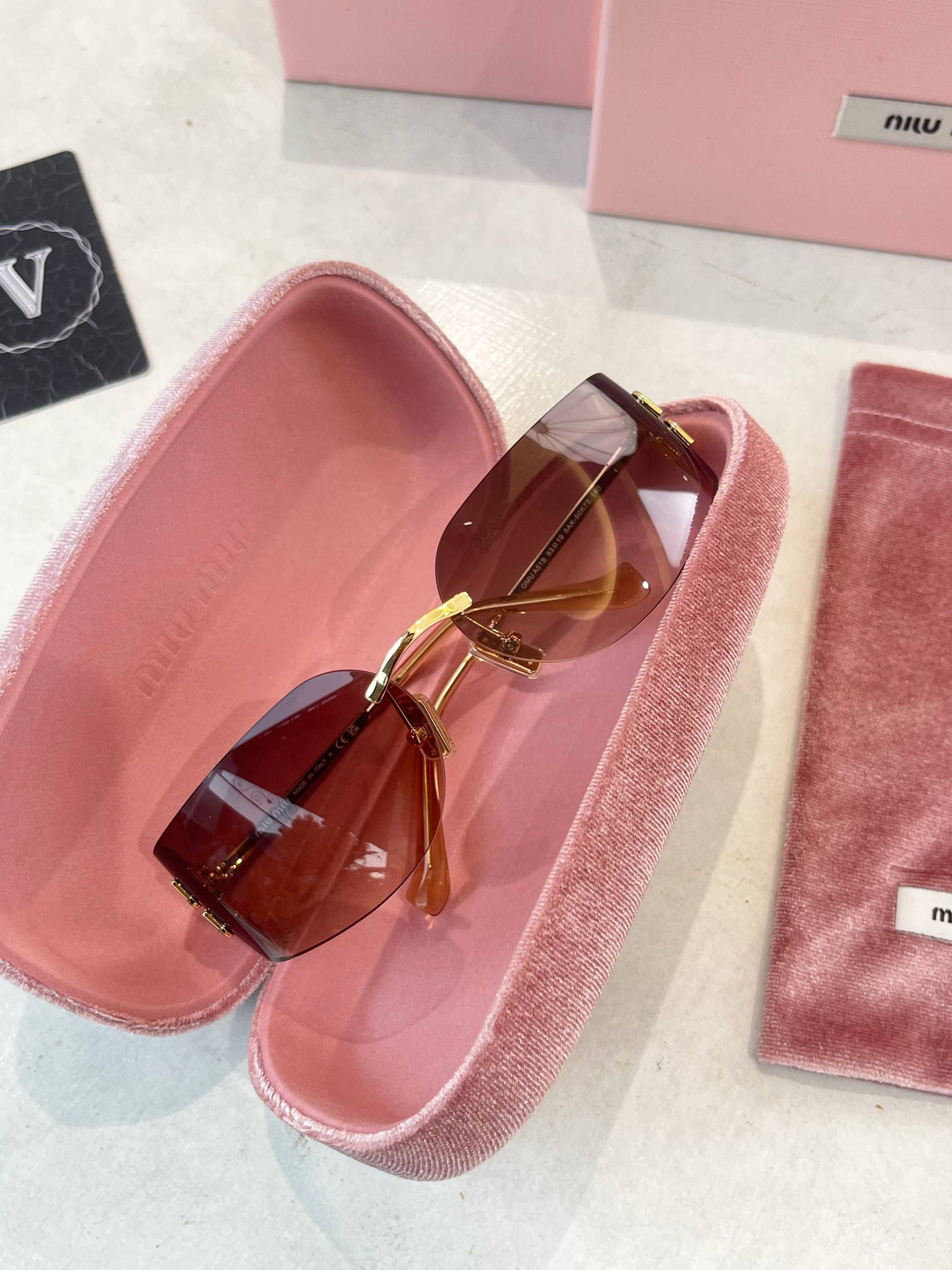 MIU MIU GLASSES