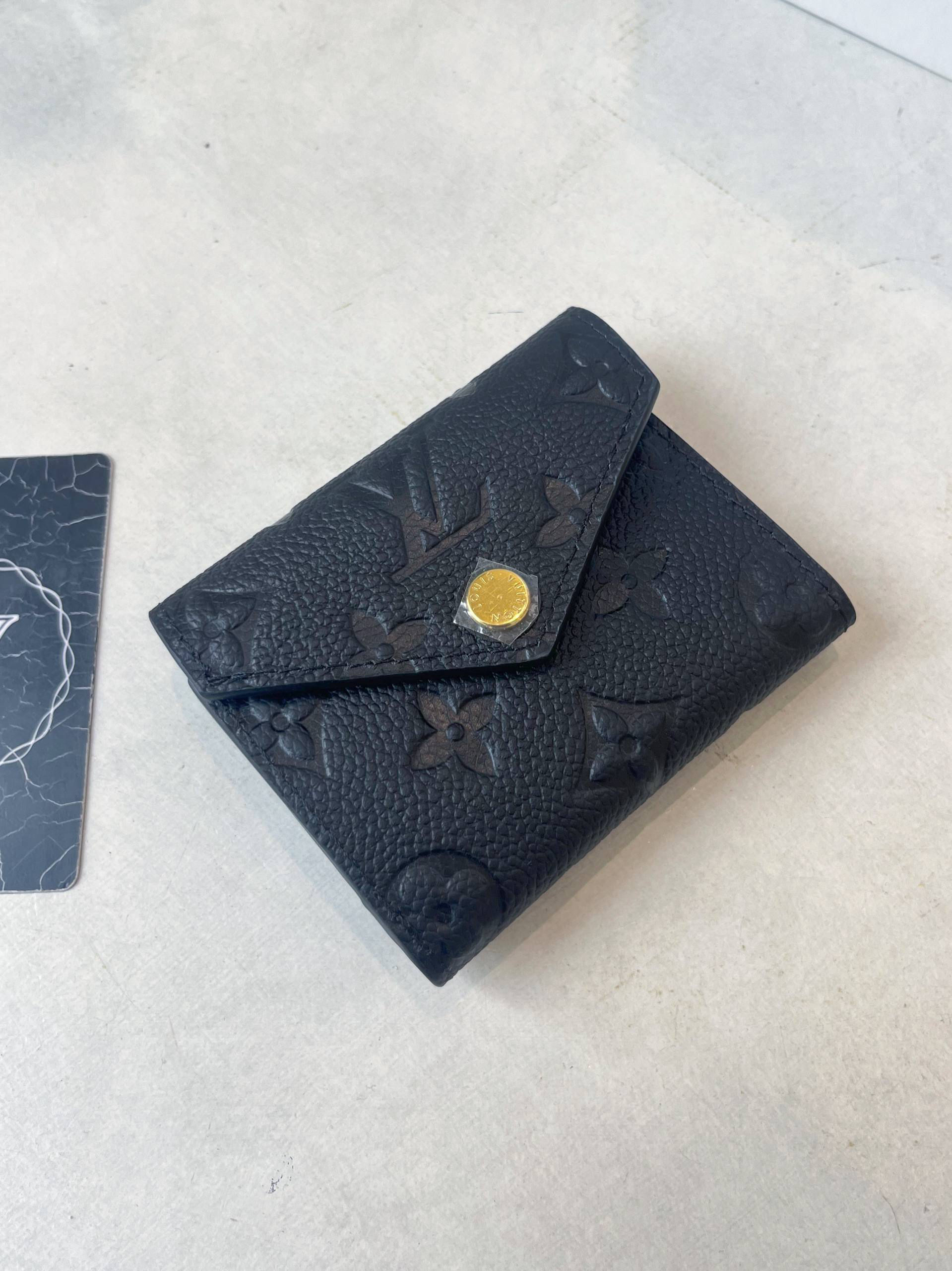 LV ZOE MONOGRAM EMPREINTE WALLET