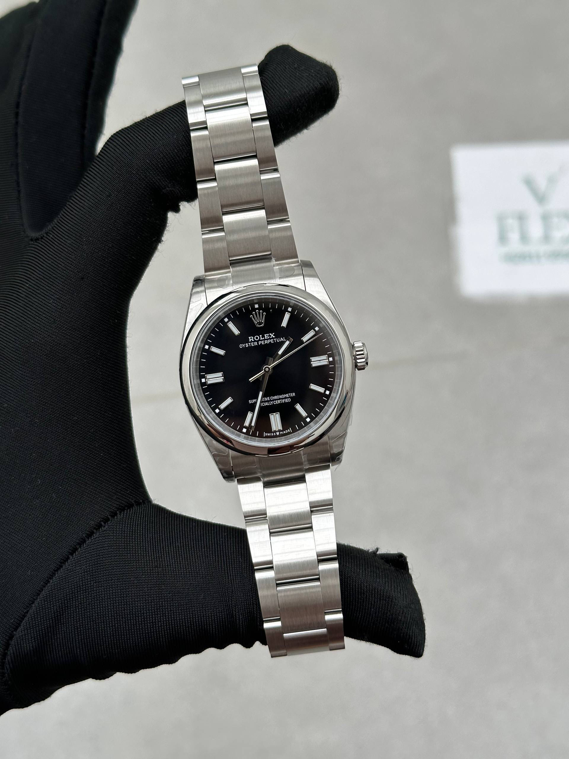 ROLEX OYSTER PERPETUAL BLACK DIAL