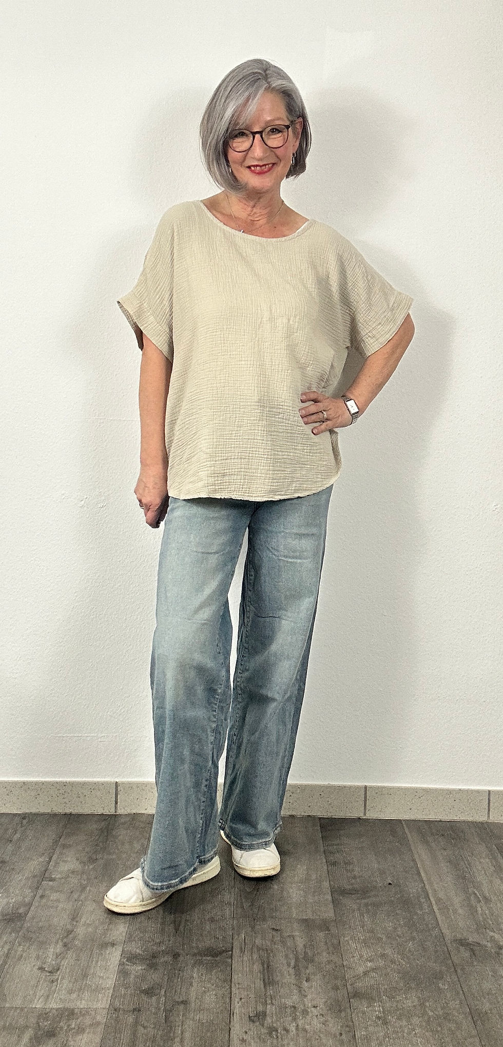 Miniaturbild: Hoch geschnittene Jeans mit weitem Bein