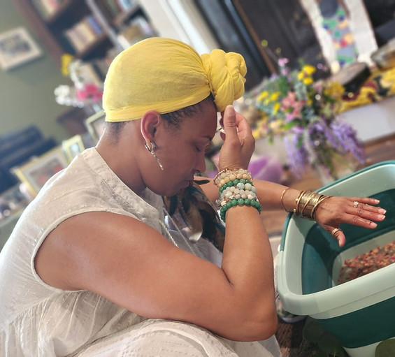 woman blessing foot bath
