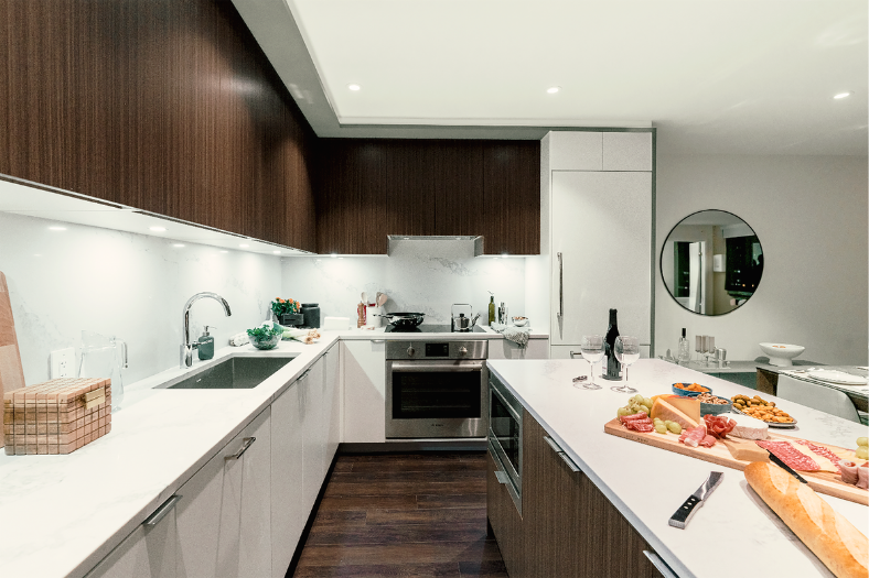 Modern kitchen area at Le Cartier luxury condo rentals.