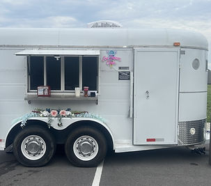 horse trailer with flowers.JPG