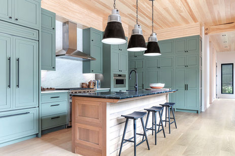 Modern industrial kitchen renovation with built-in cabinetry and custom kitchen island