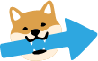 矢印を咥えた犬