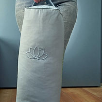 bolster cushion in pale blue with feather filling