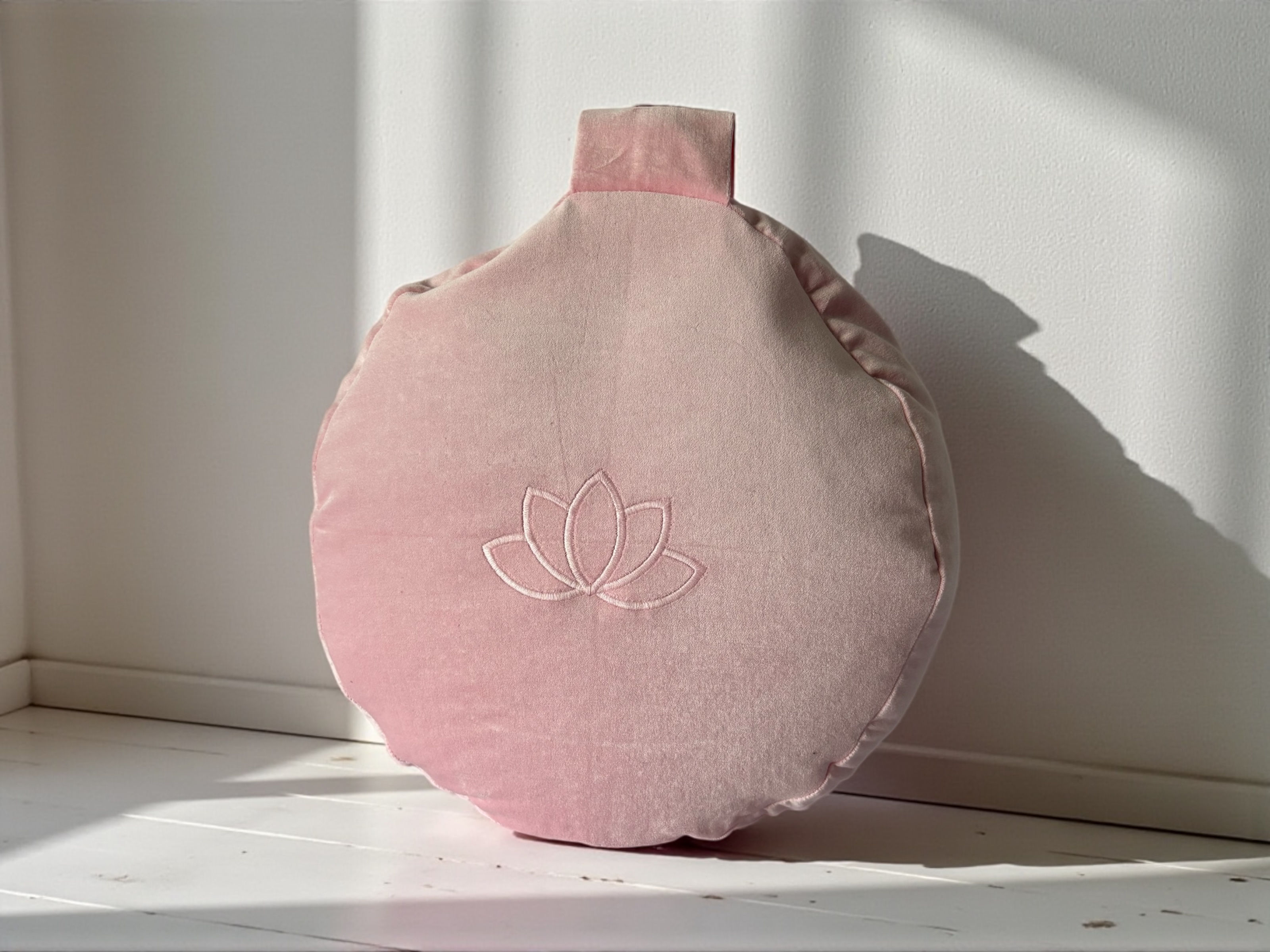 blush pink velvet meditation cushion with lotus flower