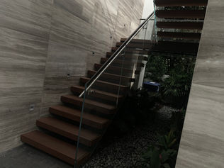 Modern staircase with glass railing in south florida 