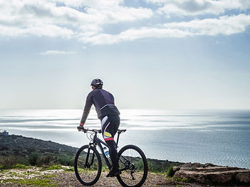 silhouetted-view-of-male-mountain-biker-on-coastal-2024-10-21-21-38-32-utc_edited.jpg