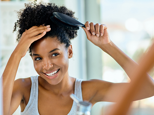 woman brushing out hair