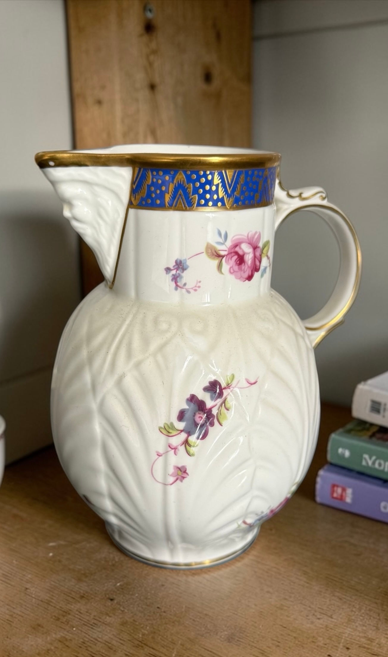Coalport. Large jug with carved face