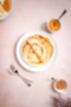 Swiss style crepes called Omelette on a white plate ready to be served.