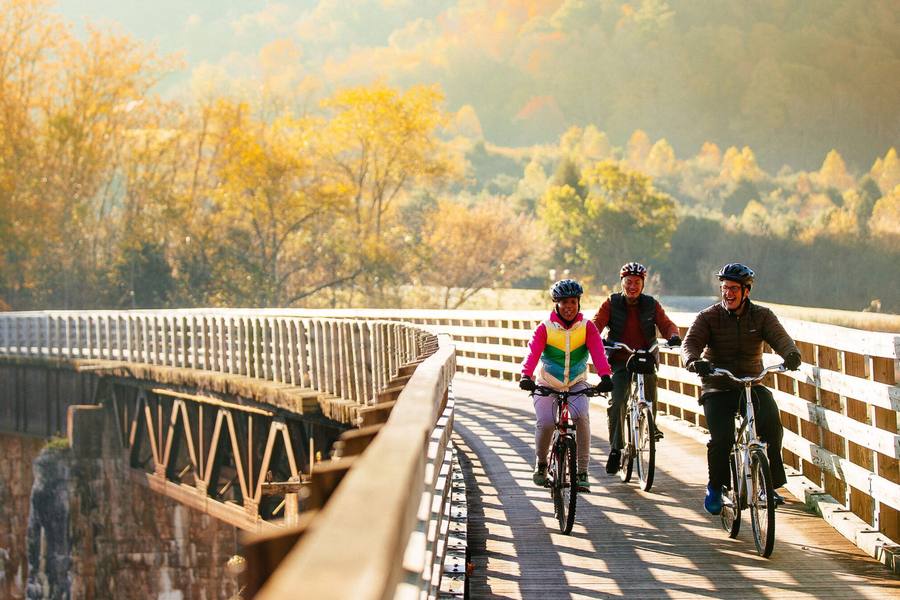 Cycling across a timber trestle on the Virginia Creeper Trail