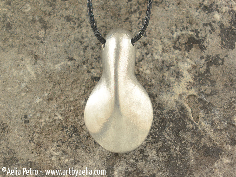 Manatee Fluke Necklace