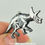 Thumbnail: Painted Resin Triceratops Skeleton Necklace