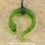 Thumbnail: Faux Green Amber Wyrm Necklace - In Stock and Ready to Ship