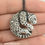 Thumbnail: Resin Snow Leopard Necklace