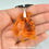 Thumbnail: Faux Cognac Amber Resting Dragon Necklace - In Stock and Ready to Ship