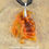 Thumbnail: Faux Cognac Amber Resting Dragon Necklace - In Stock and Ready to Ship