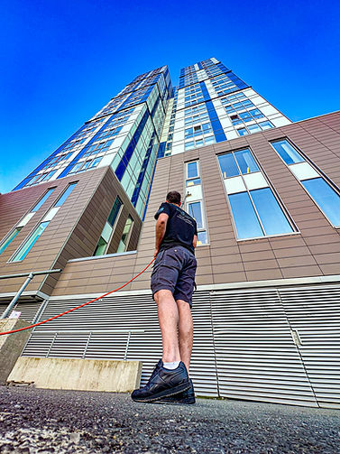 Marc using a water fed window cleaning pole on the KD Tower in Hemel Hempstead