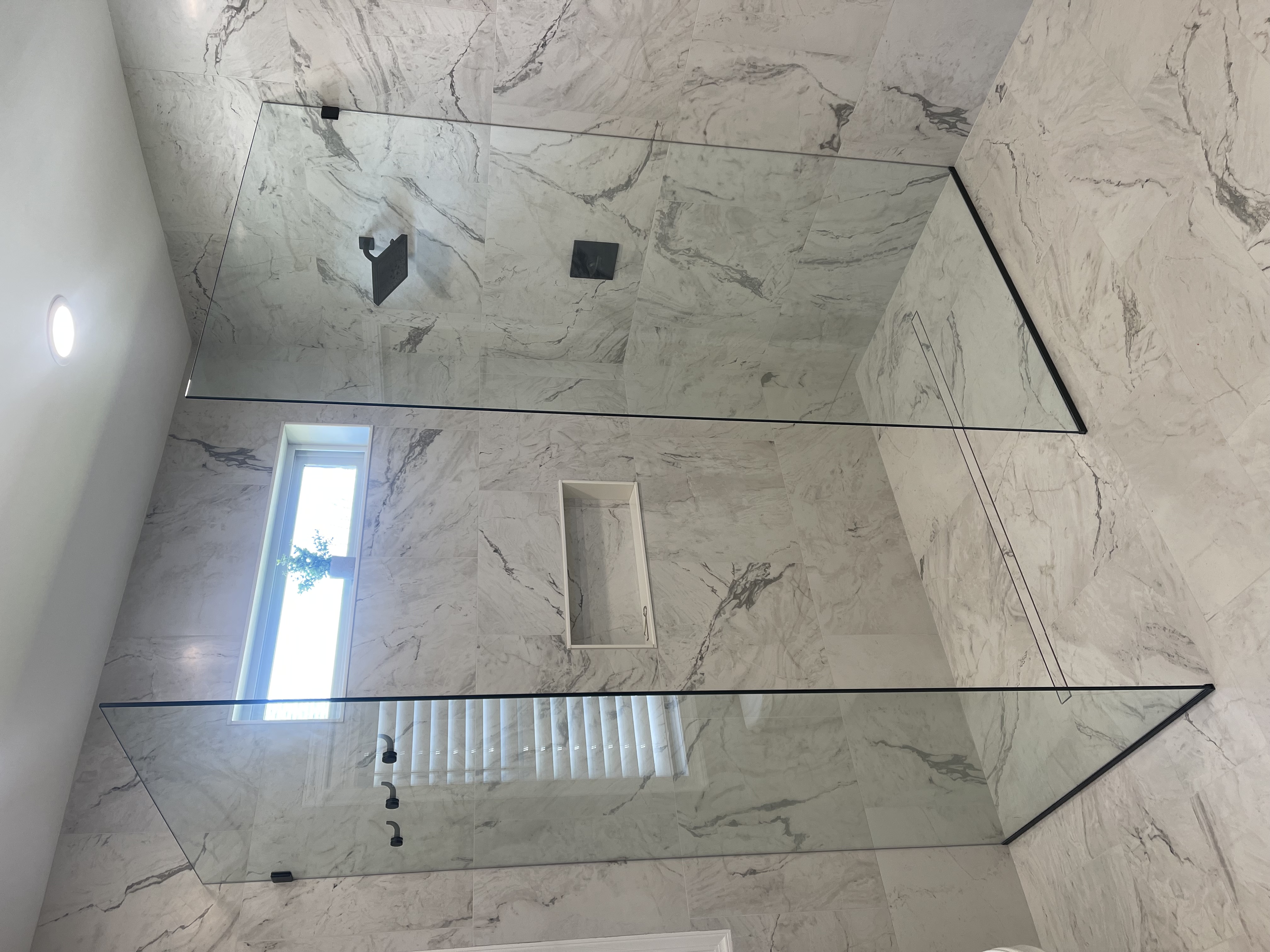 Frameless shower door install in a central PA home
