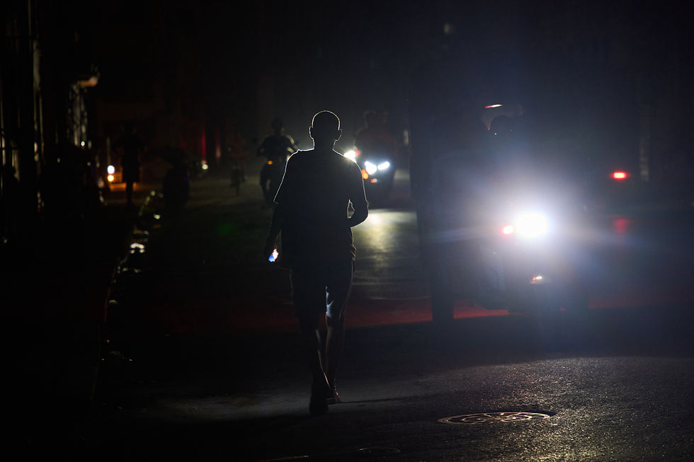 Cuba Blackout
A man walks in the dark during a blackout in Havana, Cuba, Friday, Sept. 18, 2026. (AP Photo/Ramon Espinosa)