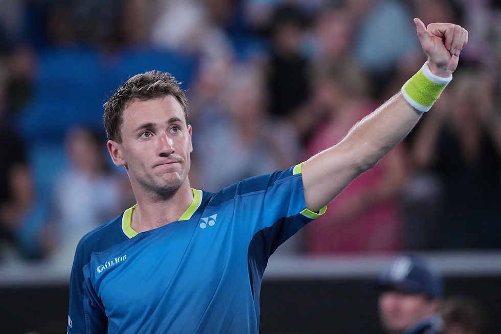 Casper Ruud of Norway waves after defeating Mattia Bellucci of Italy in their first round match at the Australian Open tennis championship in Melbourne, Australia, Monday, Jan. 19, 2026. (AP Photo/Dita Alangkara)