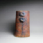 Malham Bolt 2 Ceramic vessel with vein texture, orange, blue and buff in colour with metalic coloured bolt details.