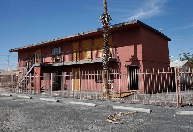 Distressed apartment building.jpg