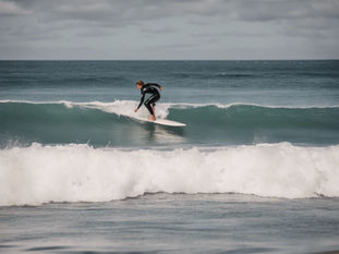 Holistic Wellness Experiences: Surf Therapy and Sweat Lodge Integration